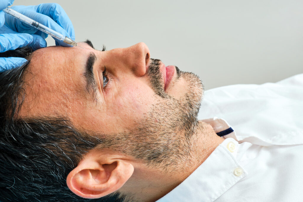 man receiving botox for headaches