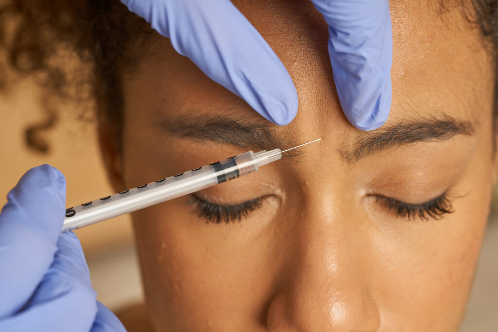 woman receiving botox to forehead 