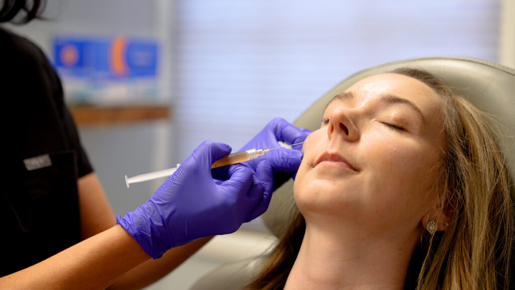 Woman receiving PRF under eye treatment